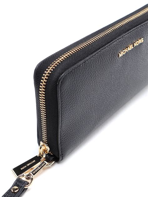 michael kors jet set item travel continental wallet clutch wristlet|michael kors silver metallic wallet.